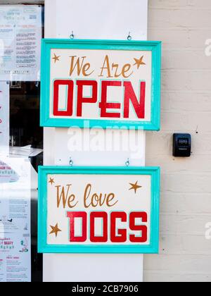 Signs on the front of Delphines, 1950's themed restaurant and diner in Aldeburgh Suffolk UK Stock Photo