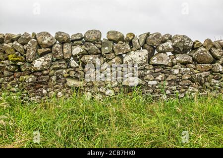 Scottish dry stone wall. Stock Photo