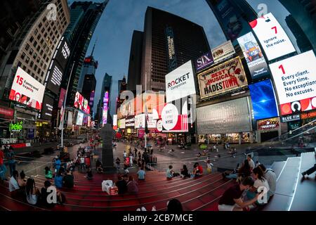 Giant video screens in Times Square in New York on Thursday, August 6, 2020 commemorate the initial public offering of the Rocket Companies which debuted on the New York Stock Exchange. Rocket Cos. is the parent of Quicken Loans(© Richard B. Levine) Stock Photo