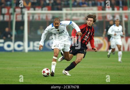 Milan  Italy  06 April 2005, 'G.MEAZZA SAN SIRO ' Stadium, Football championship Seria A 2004/2005,  AC Milan - FC Inter   : Juan Sebastian Veron and Andrea Pirlo in action during the match Stock Photo