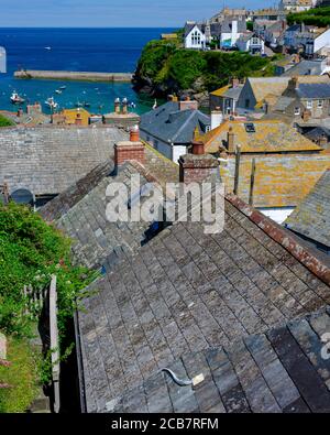 Port Isacc, UK - July 12, 2020:  Views over the rooftops of Port Isaac on the north coast of Cornwall, UK Stock Photo