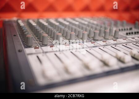Close-up view of DJ channel mixing controller Stock Photo