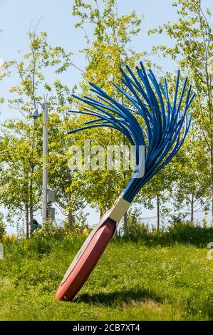 Large sculpture of wheel typewriter eraser with brush in Olympic Sculpture Park in Seattle, Washington.  Image taken in 2009. Stock Photo