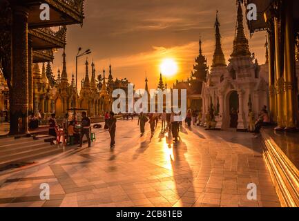 Yangon, Myanmar - December 18th 2017: Sunset light on the Shwedagon Pagoda in Yangon, Myanmar Stock Photo