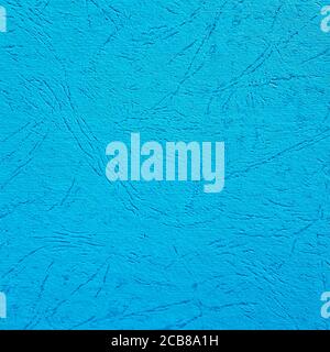 Texture of blue cardboard with dark folds. Effect of crumpled background for templates and decoration. Vector illustration. Stock Vector