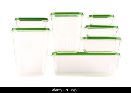 Plastic containers for storing food of different sizes isolated on white background. Close up. Copy space. Stock Photo