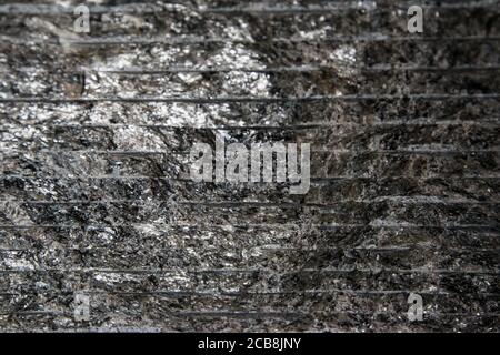 Striped stone wall background. Stone interior. Wall decoration.  Stock Photo