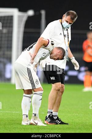 FC Basel's Taulant Xhaka leaves the field after being fouled during the