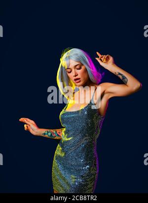 Fashion portrait of beautiful woman on colored background Stock Photo
