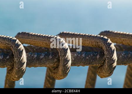 Close-up on iron bar reinforcement on a construction site. Stock Photo