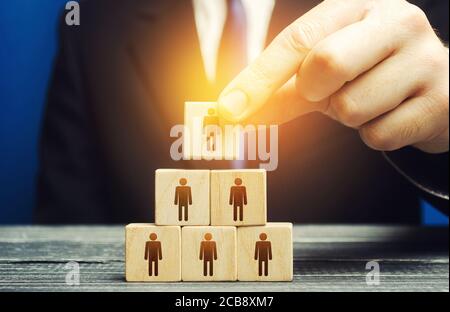 The business leader establishes the structure of the company. Recruiting and appointing employees for suitable posts, creation effective business mode Stock Photo