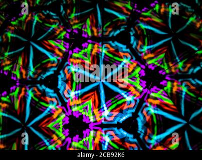 3D rendering or 3D rendering. Kaleidoscopic three-dimensional image. Symmetry with colored lights on a black background. Stock Photo