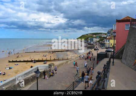 Cromer classic Norfolk seaside town situated on cliff-top overlooking sandy beaches Pier with Lifeboat Station and Pavilion Theatre which stages shows Stock Photo