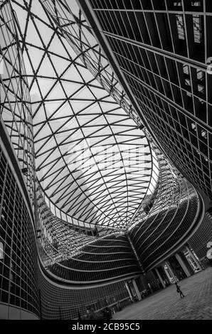 Milan/Italy- July 12, 2019: architectural detail of the modern glass Lombardy Building (Palazzo Lombardia), a 161 m tall skyscraper and the main seat Stock Photo