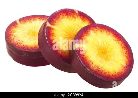 Purple Haze carrot (Daucus carota var. sativus) slices, isolated Stock Photo