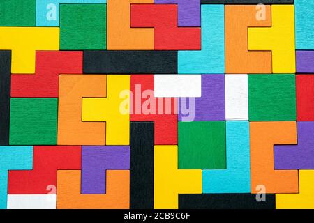 Colored wooden blocks. Puzzle, mind game and toy. Abstract background Stock Photo