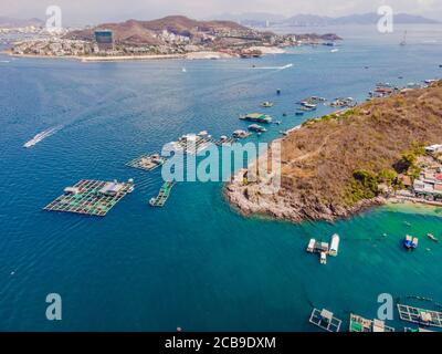 Lots of marine farms in a blue sea water. Sea farming concept Stock Photo