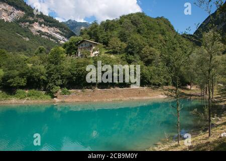 Turquoise lake in the mountains. Panoramic view of Lake Tenno in autumn, Trento, Italy, Europa. Mountain lake in the alps of Italy Stock Photo