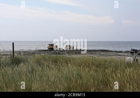 Pipeline tubes for sand replenishment. Bach nourishment to make wider beaches to reduce storm damage to coastal structures. Hel, Poland. Stock Photo