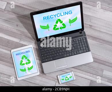 Recycling concept shown on different information technology devices Stock Photo