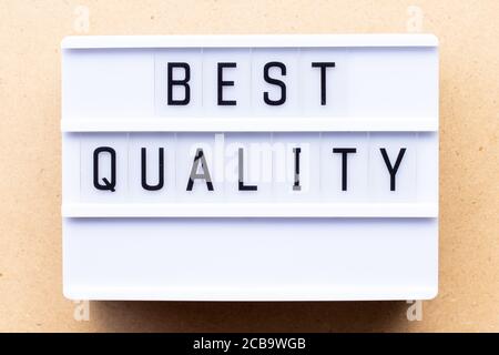 Lightbox with word best quality on wood background Stock Photo
