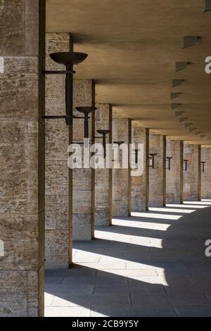 Classic Nazi architecture with line of pillars along corridor in Berlin Olympic Stadium Stock Photo