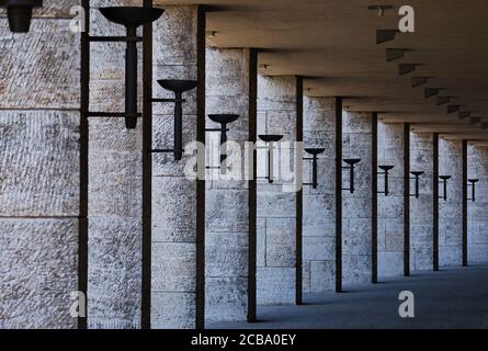 Classic Nazi architecture with line of pillars along corridor in Berlin Olympic Stadium Stock Photo