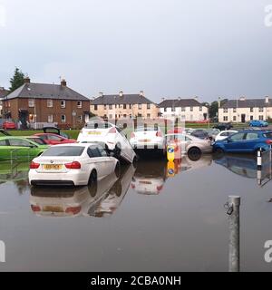 Flooding at Queen Victoria Hospital car park, in Kirkcaldy, Fife, Scotland. Thunderstorm warnings are still current for most of the UK on Wednesday, while high temperatures are forecast again for many parts of England. Stock Photo