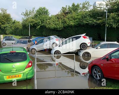 Flooding at Queen Victoria Hospital car park, in Kirkcaldy, Fife, Scotland. Thunderstorm warnings are still current for most of the UK on Wednesday, while high temperatures are forecast again for many parts of England. Stock Photo
