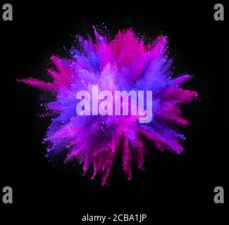 Multi colored powder explosion isolated on black background. Freeze motion of abstract dust texture. Stock Photo