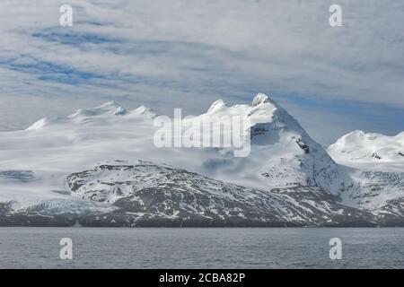 King Haakon Bay, snow covered mountains and glaciers, South Georgia, South Georgia and the Sandwich Islands, Antarctica Stock Photo