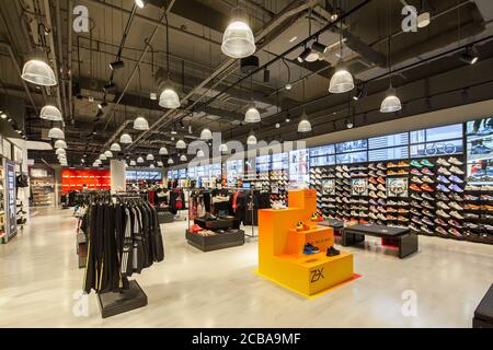 Interior of Foot Locker design and a huge wall art at Orchard