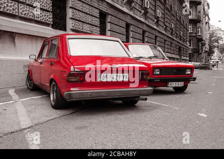 Belgrade / Serbia - September 1, 2019: old vintage yugoslavian red colored vehicles parked on the street Stock Photo