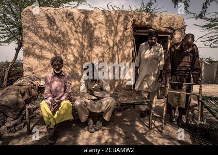 Father and brothers of Christin Asia Bibi, who was sentenced to death for blasphemy but emigrated to Canada, live completely impoverished near Lahore Pakistan. The family of Asia Bibi is also threatened with death and now lives hidden in a small village. Stock Photo