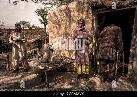 Father and brothers of Christin Asia Bibi, who was sentenced to death for blasphemy but emigrated to Canada, live completely impoverished near Lahore Pakistan. The family of Asia Bibi is also threatened with death and now lives hidden in a small village. Stock Photo