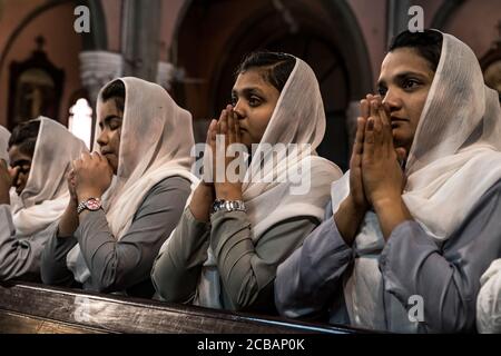 Believers christians during the Friday light fair service in the Sacred Heart Cathedral in Lahore in Pakistan. In 2015, the parish was attacked in the cathedral during a bomb attack where numerous victims were reported. Stock Photo