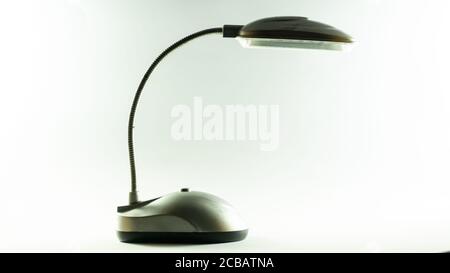 Table lamp in computer mouse shape in white background soft light side posture clicking Stock Photo