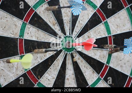 Darts target closeup. Success hitting target aim goal achievement concept