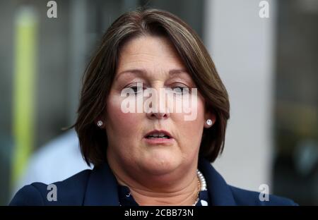 Caroline Donohoe, the widow of Adrian Donohoe, speaks to the media outside the Criminal Courts of Justice, Dublin, where the jury agreed 11-1 in favour of the guilty verdict after 22 hours of deliberation in the Aaron Brady trial for the capital murder of Detective Garda Adrian Donohoe, who was shot dead during a robbery at Lordship Credit Union near Dundalk in January 2013. Stock Photo