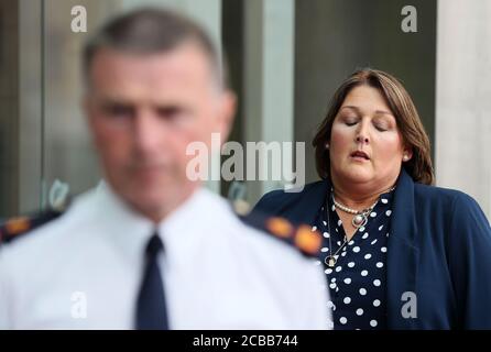 Caroline Donohoe, the widow of Adrian Donohoe, outside the Criminal Courts of Justice, Dublin, where the jury agreed 11-1 in favour of the guilty verdict after 22 hours of deliberation in the Aaron Brady trial for the capital murder of Detective Garda Adrian Donohoe, who was shot dead during a robbery at Lordship Credit Union near Dundalk in January 2013. Stock Photo