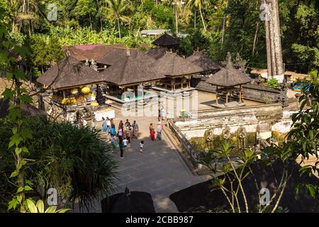 Bali, Indonesia - 30 June, 2019: People walking in the Pura Goa Gajah. The temple, known as Elephant Cave, is located in Ubud and was originally creat Stock Photo
