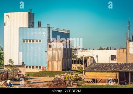 Territory of abandoned industrial area waiting for demolition. Stock Photo