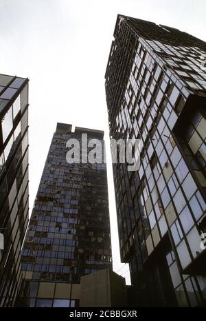 12th April 1994 During the Siege of Sarajevo: the bomb-damaged Unis Towers on Sniper Alley. Stock Photo