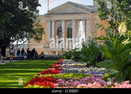 05 August 2020, Saxony-Anhalt, Halle (Saale): The green area in front of the opera house in Halle/Saale is in full bloom. The house was opened in 1886 with Friedrich Schiller's 'Wallensteins Lager' and 'Die Piccolomini'. Photo: Hendrik Schmidt/dpa-Zentralbild/ZB Stock Photo