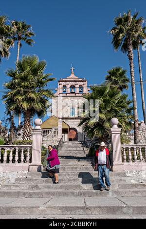 Pilgrims depart the chapel where Saint Toribio Romo was the parish priest in Santa Ana de Guadalupe, Jalisco State, Mexico. Father Toribio was a Mexican Catholic priest and martyr who was killed during the anti-clerical persecutions of the Cristero War.