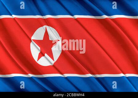 Colorful Korea North flag waving in the wind. Stock Photo