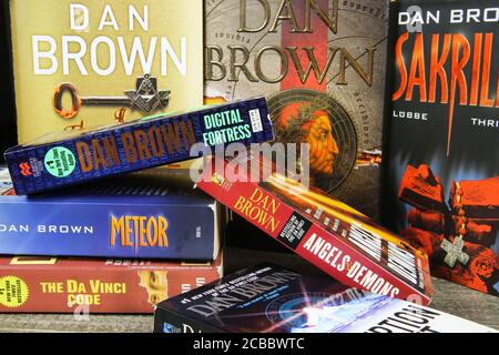 Viersen, Germany - July 9. 2020: View on isoalted stack different books from american author Dan Brown (focus on center) Stock Photo