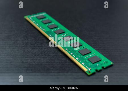 The computer's RAM is on a black surface Stock Photo