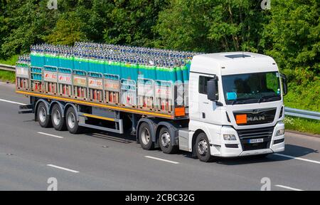 BOC industrial gases Haulage delivery trucks, lorry, transportation, Man TGX truck, cargo carrier, MAN vehicle, European commercial transport industry HGV, M6 at Manchester, UK Stock Photo