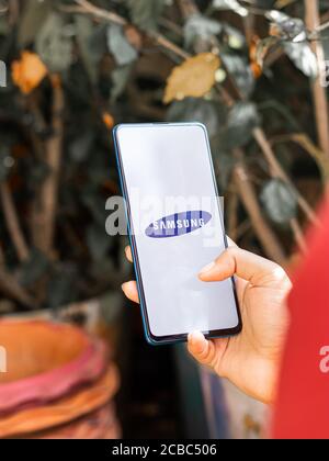 Assam, india - Augest 9, 2020 : Samsung logo on a phone screen stock image. Stock Photo